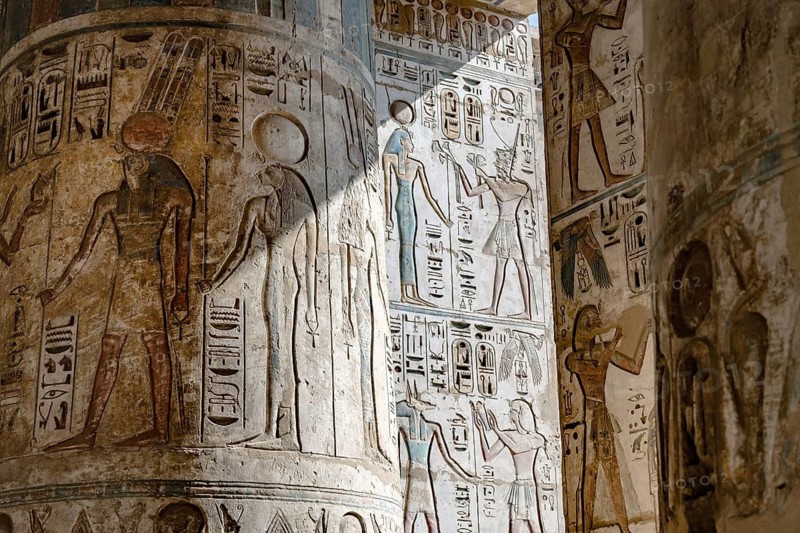 Close up details of ancient Egyptian history shown in reliefs and hieroglyphs inside Medinat Habu, the ancient Egyptian Mortuary Temple of Ramesses III on the West Bank of The Nile, Luxor, Egypt