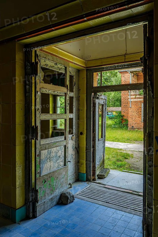 Dilapidated entrance to the former pulmonary sanatorium and lost place Heilstätte Grabowsee, Oranienburg, Brandenburg, Germany