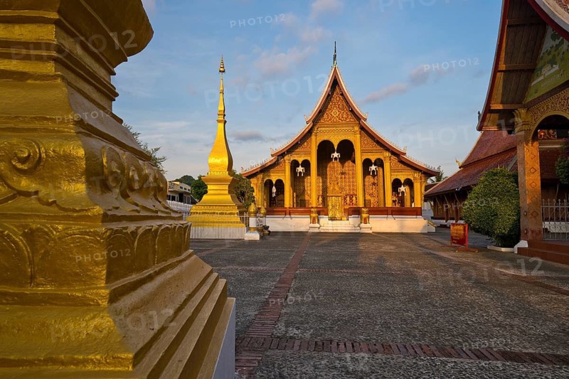 Sunrise, morning atmosphere at Wat Sibounheuang Buddhist monastery, Luang Prabang, Laos, Southeast Asia