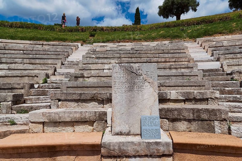 Ancient amphitheatre with rows of stone seats and an inscription panel, ancient site, archaeological site, Messene, Messini, Messinia, southwest of the Peloponnese, odyssey, Odyssey, Odysseus, Ulysses, film, filming location, Matt Damon, Peloponnese, peninsula, Greece