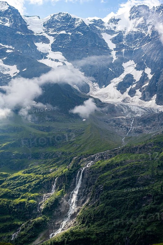 Schmadribachfall waterfall and picturesque mountain landscape with Breithorn mountain peak, Bernese Alps, Bernese Oberland, Switzerland