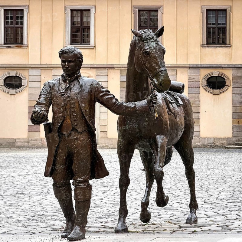 Life-size bronze sculpture, equestrian statue of the late reading rider by Valerie Otte in the courtyard of the city palace, Fulda, East Hesse, Hesse, Germany