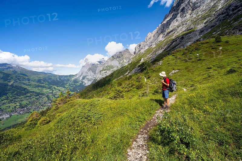 Hikers on the Eigertrail hiking trail, view of mountain peaks, Grindelwald, Bernese Oberland, Switzerland
