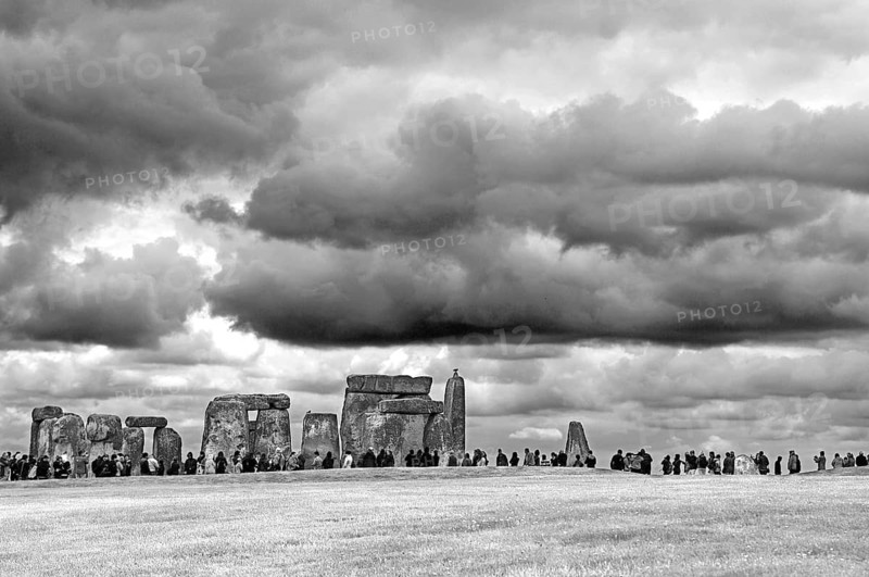 Tourists visit Stonehenge, around 3000 BC, a megalithic structure of the Neolithic period, black and white, Wiltshire, southwest England, England, United Kingdom