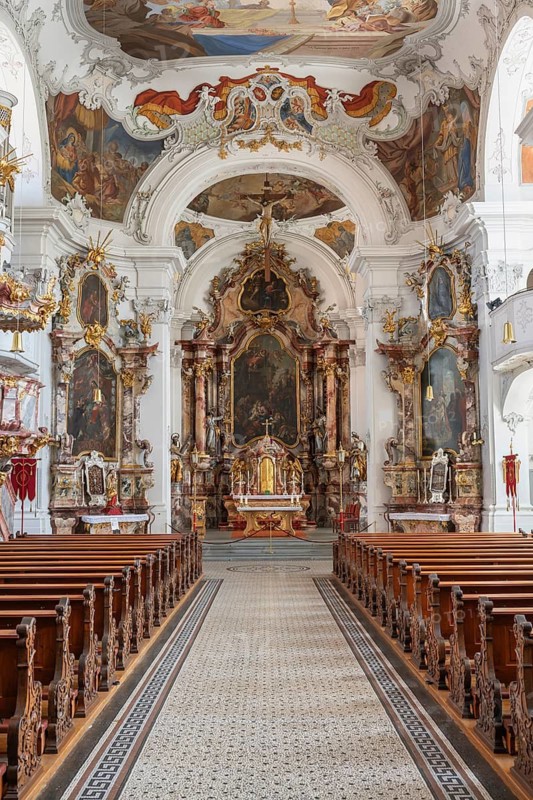 Magnificent baroque interior with ornate ceiling frescoes and stucco work by the Cathedral of Our Lady in Lindau am Lake Constance, Swabia, Bavaria, Germany