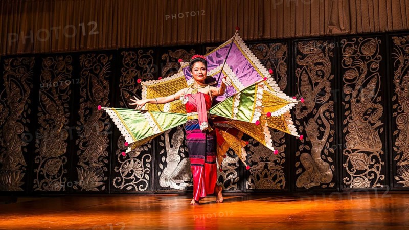 Young Thai woman with fan-like wings showing a traditional dance, Old Chiang Mai Cultural Center, Chiang Mai, Thailand