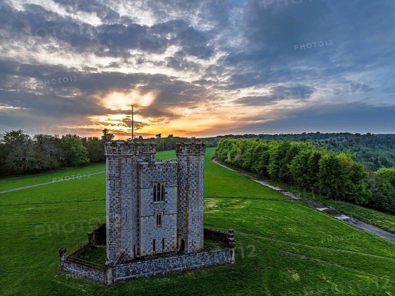 Sunset over Hiorne's Tower from a drone, Arundel, West Sussex, England, United Kingdom