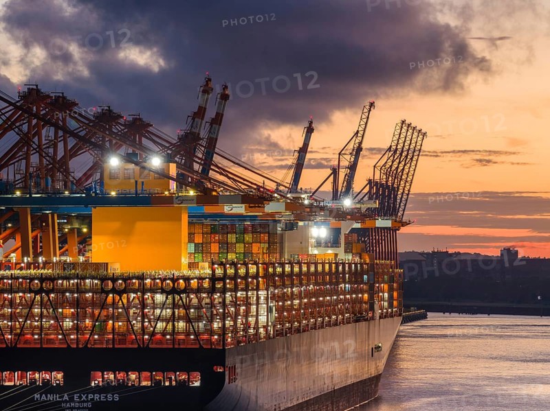 Aerial view at Waltershof harbour during the Blue Hour at the berths of Eurogate Container Terminal Hamburg (CTH) with the Manila Express (Hapag-Lloyd), Hamburg, Germany