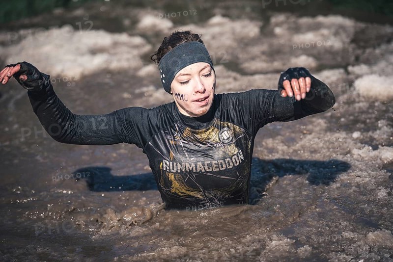 WROCLAW, POLAND - APRIL 7, 2018: Extreme running with obstacle RUNMAGEDDON. In the picture a runner on the Recruit route