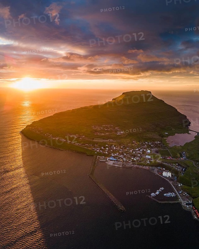 Sunset with aerial view of Eidi, Faroe Islands