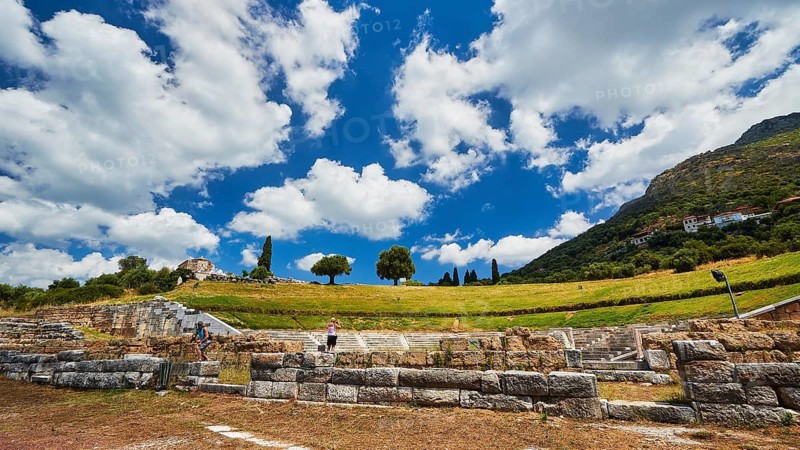 Ruins of an ancient wall with mountains and clouds in the background, ancient site, amphitheatre, Messene, Messini, Messinia, southwest of the Peloponnese, odyssey, Odyssey, Odysseus, Ulysses, film, filming location, Matt Damon, Peloponnese, peninsula, Greece