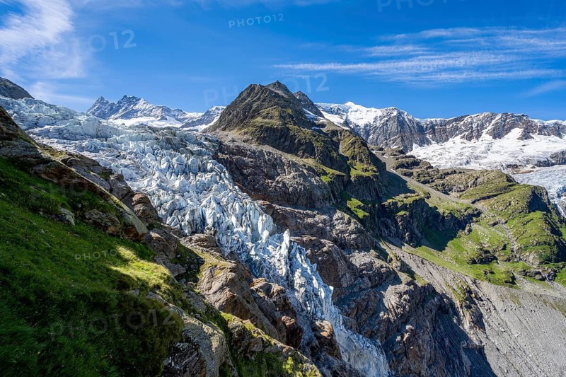 Mountain panorama, picturesque high-alpine mountain landscape with Lower Eismeer glacier range and Grindelwald-Fiescherfirn glacier, hiking to Schreckhornhütte, Bernese Oberland, Switzerland