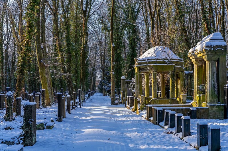 Tombstones and graves covered by snow in winter, Weissensee Jewish Cemetery, Berlin Pankow-Weissensee, Germany