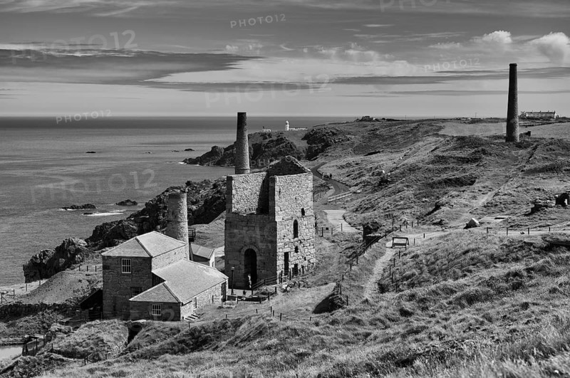 Steam boiler house, winch building, pump building, cooling pond, ruin, Levant mine, tin mine, mining, behind lighthouse Pendeen Lighthouse, Pendeen, Trewellard near St Just in Penwith, black and white, coast, cliffs, Cornwall, England, Great Britain, Great Britain