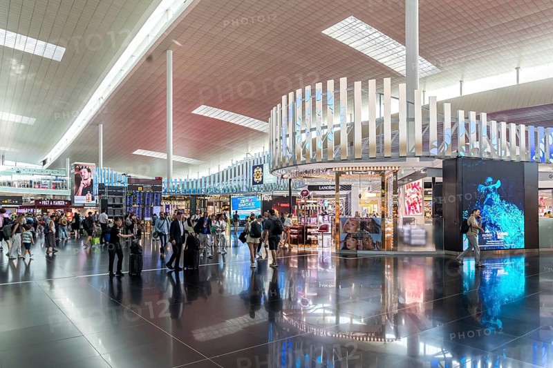 Terminal T1 with duty free shops at the airport in Barcelona, Spain