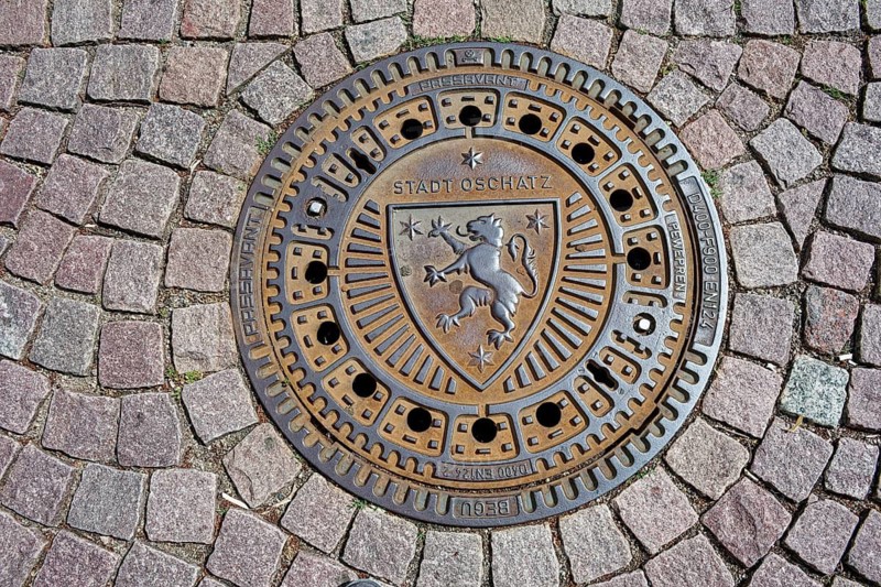 Manhole cover of the city of Oschatz, manhole cover, Oschatz, Saxony, Germany