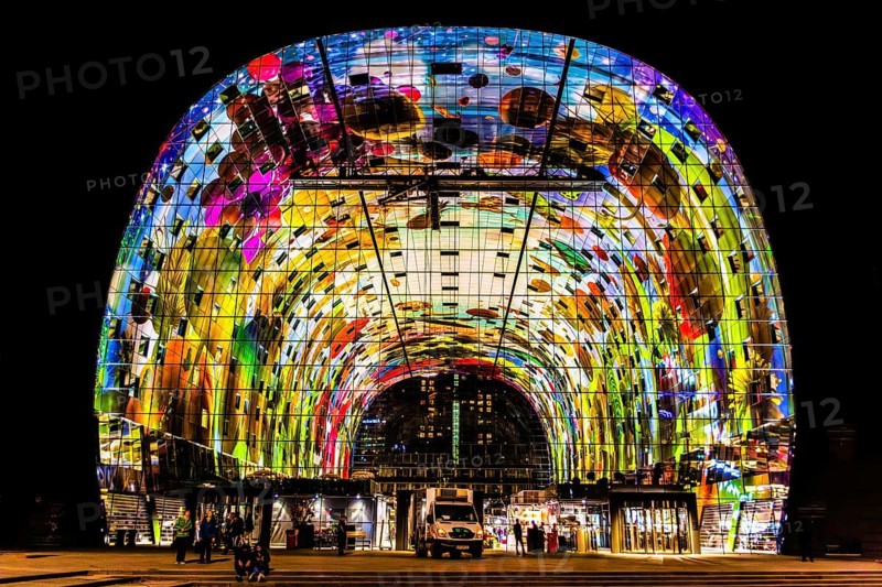 Markthal from 2014, offers over 100 food stalls and delicatessens with spectacular ceiling fresco cornucopia, Horn of Plenty by Arno Coenen and Iris Roskam, Rotterdam, the Netherlands