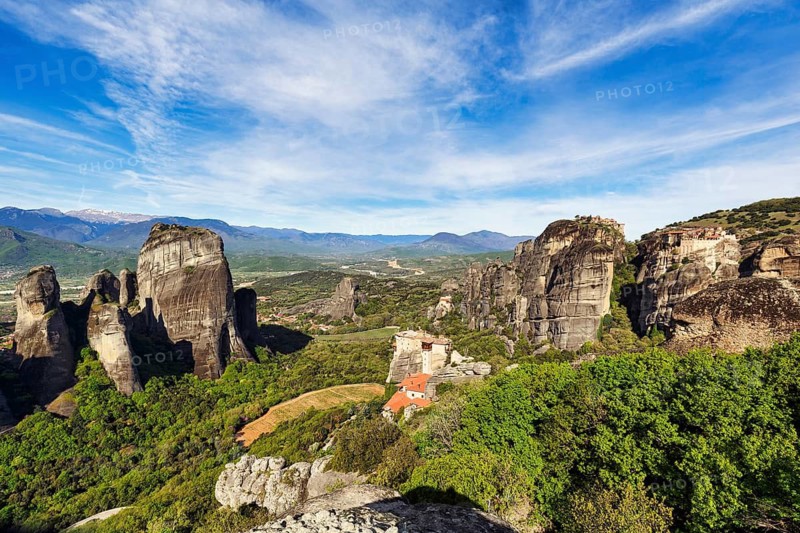Hermitages between high rocks, monasteries on sandstone formations, Meteora, Cirrus, spring weather, Kalambaka, Thessaly, Greece