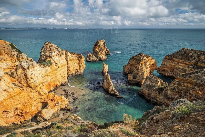 View of the majestic shoreline cliffs around Ponte da Piedade in Lagos, Portugal