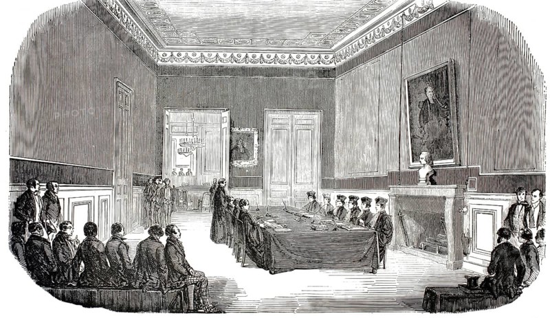Exterior view of the École de Droit, Faculty of Law, in Paris. Exam in the boardroom, a student takes his final oral exam in front of a commission of several professors sitting at a long table in traditional robes, illustration, reproduction from a 19th-century model. Authentic, file restored for optimal use, exact date of submission unknown, historical
