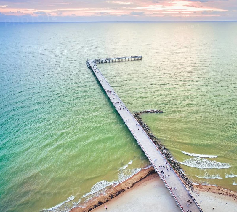Palanga main bridge from above with tourists and baltic sea aves crashin.Holidays in baltics. Palanga. Lithuania