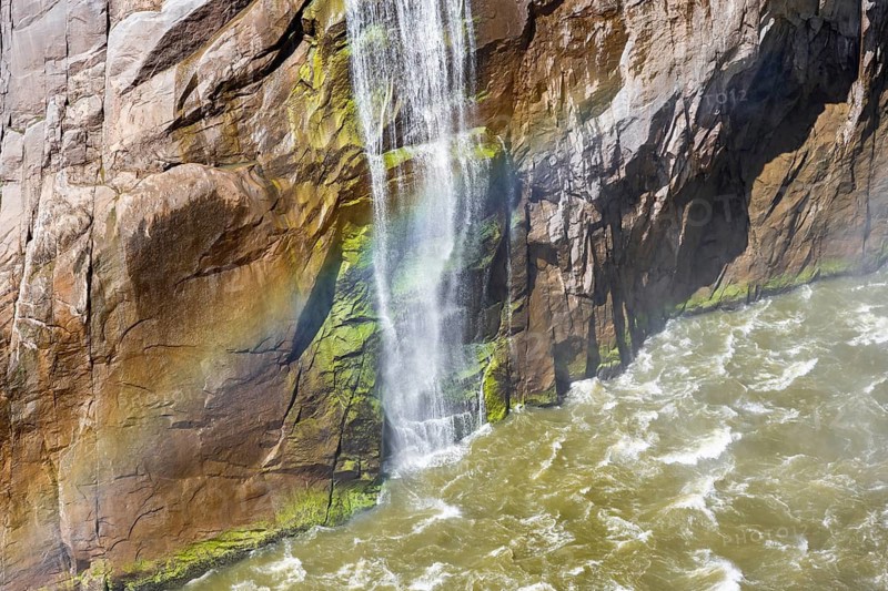 Rainbow on tips at the Orange River waterfall, Augrabies Falls National Park, North Cape, South Africa
