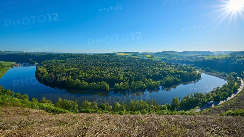 Sunlight sparkles over a picturesque river landscape, Mainschleife, Urphar, Wertheim, Main Tauber Kreis, Spessart, Lower Franconia, Baden-Württemberg, Germany