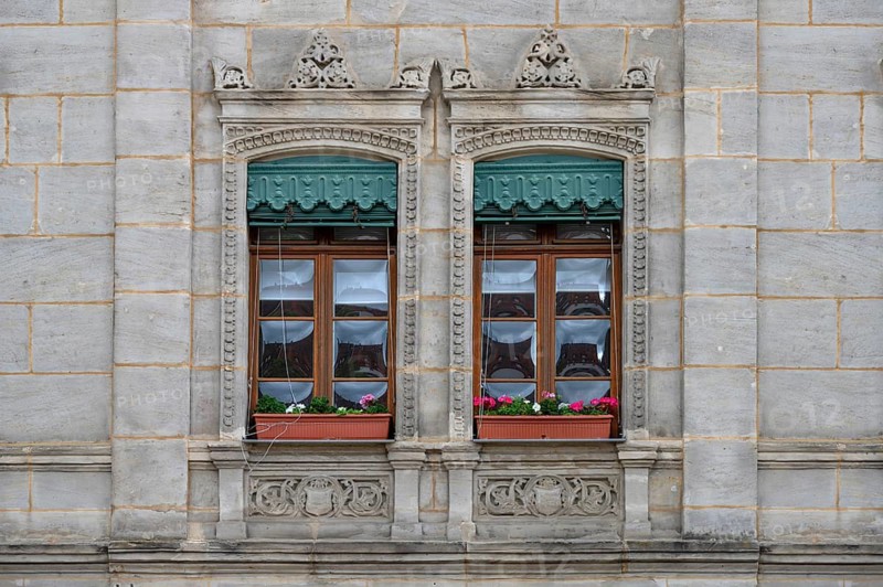 Historic windows from the 19th century, with green, decorative metal shutters, Unterer Markt 5, Altdorf, Middle Franconia, Bavaria, Germany