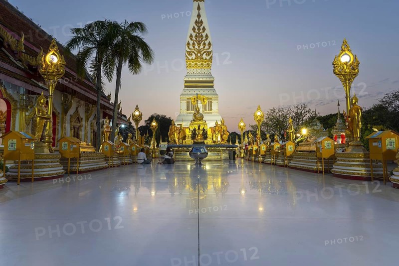 Chedi decorated with golden ornaments at Wat Phra That Phanom at sunset, temple complex in Amphoe That Phanom, Nakhon Phanom Province, Isan, Thailand