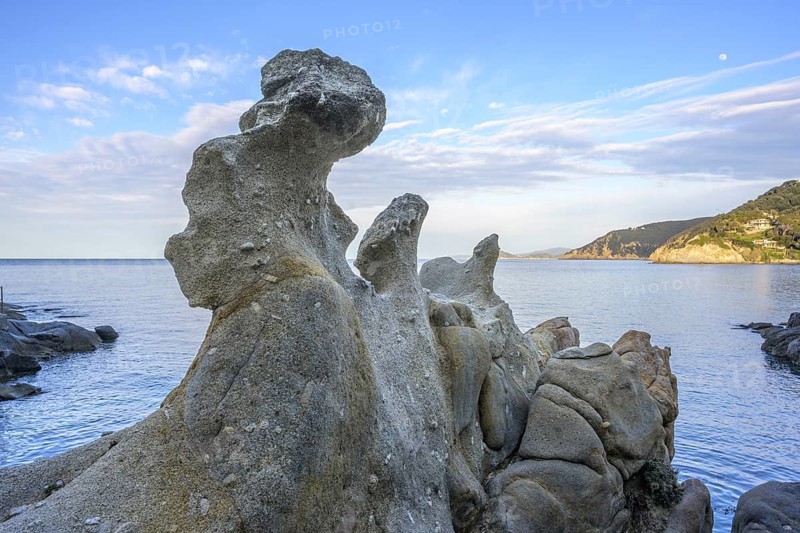 Road along the coast with beautiful rock formations to, Capo Sant Andrea, Marciana, Livorno Province, Italy