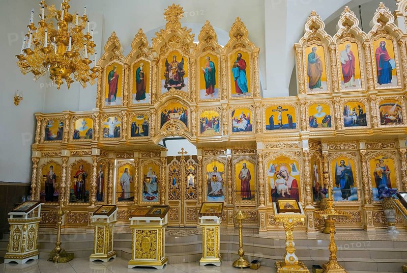 A magnificent golden iconostasis in an Orthodox church with numerous religious icons, Nicoreni monastery Sf. Ilie, Nicoreni, Drochia, Bessarabia, Republic of Moldova, Moldova