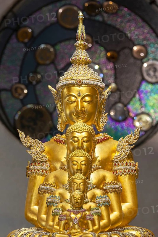 The Buddhas nestled within one another symbolise the inner journey, the continuity of the teachings and the infinite radiance of the Dharma, Main Chedi (Phra That), Wat Phra That Sorn Kaew Buddhist temple complex, Khao Kho Mountains, Phetchabun Province, Isan, Thailand