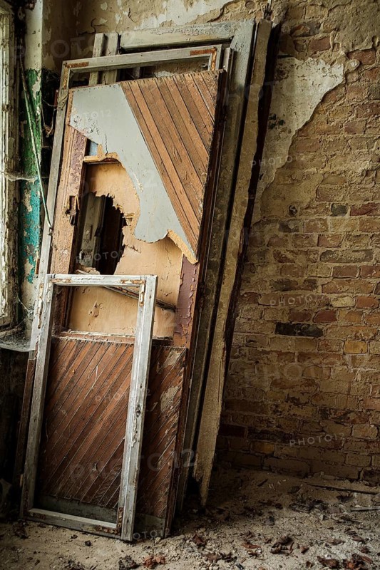 Dilapidated frame of windows and doors, former lung hospital and lost place health resort Grabowsee, Oranienburg, Brandenburg, Germany