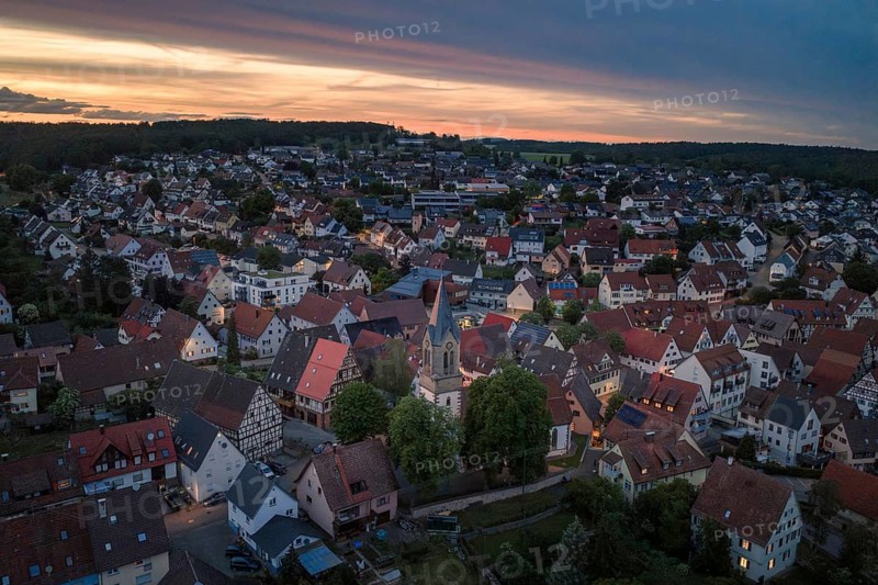 Expansive view of a village at sunset with cloudy sky, Gechingen, Hecken and Gäu region, Landreis Calw, Germany