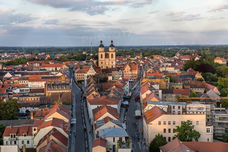 City view with city church in the evening, Luther city Wittenberg, Saxony-Anhalt, Germany