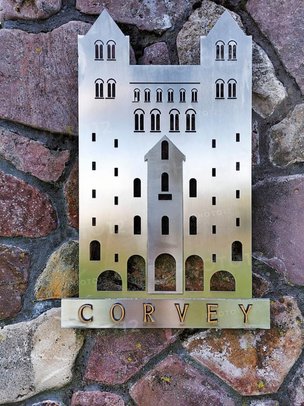 Metal sign with lettering, showing the historic Carolingian Westwork by Corvey, reconstruction, quarry stone, Weser cycle path, Stahle village, Höxter, Germany