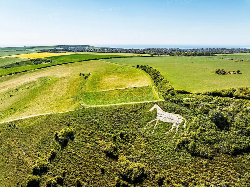 Litlington White Horse over Cuckmere Valley from a drone, Hindover Hill, South Downs, East Sussex, England, United Kingdom