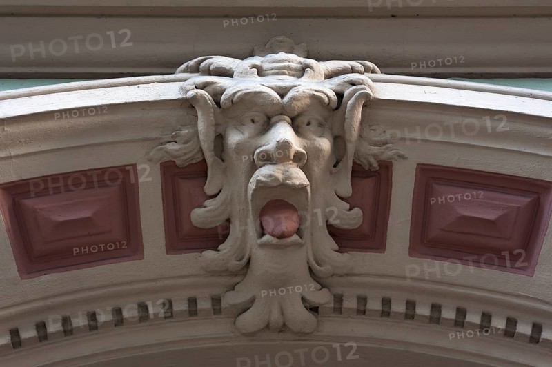 Grotesque at an entrance portal, Munich, Bavaria, Germany