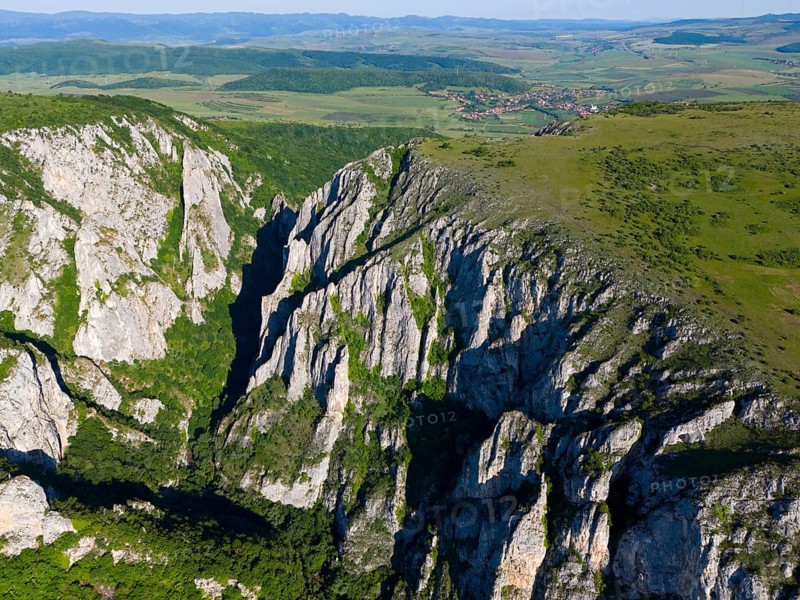Aerial view of impressive rock formations and vast valleys under a clear sky, aerial view, Cheile Turzii, Turda Gorge, Thorenburg Gorge, Turda, limestone gorge in the Trascau Mountains, Trascau, nature reserve, Western Carpathians, Transylvania, Romania
