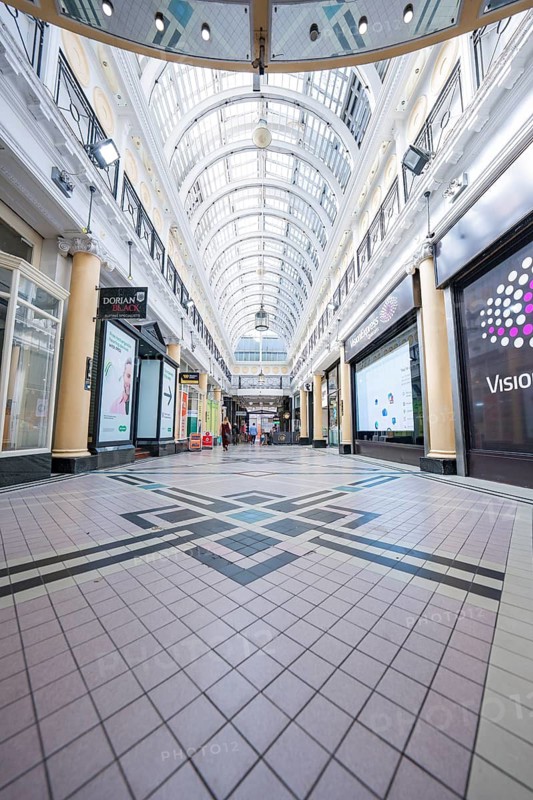 Empty passage with glass roof and decorative tile floor, elegant architecture, Dublin, Ireland