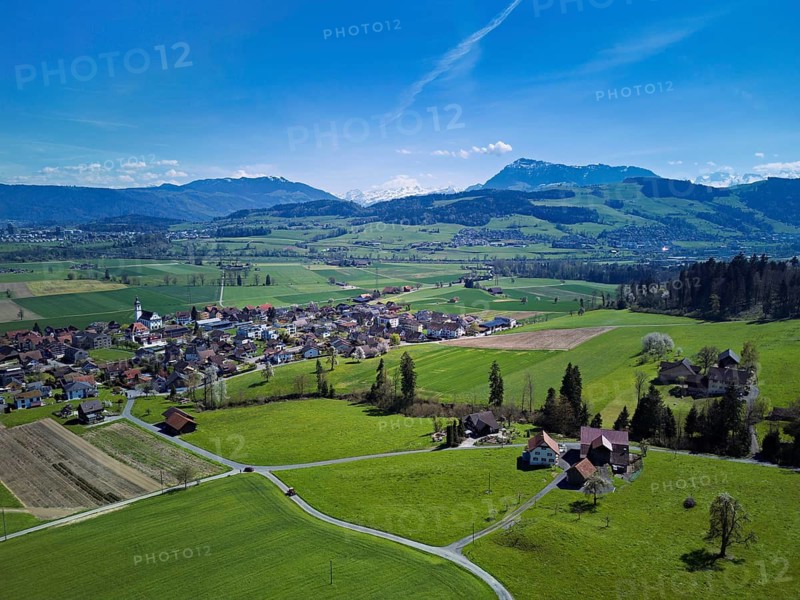 View of the village with the Alps with the Rigi in the background, Dietwil, Freiamt, Canton of Aargau, Switzerland
