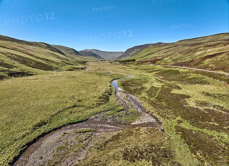 Aerial drone view of the highland landscape in the Cairn Gorm National Park, Scotland, UK