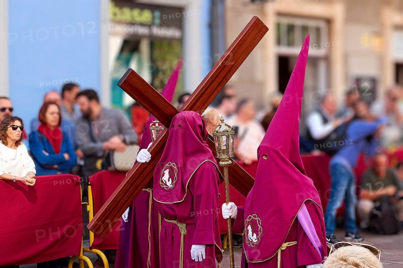 Masked participants in purple costumes wear crosses during a procession, Good Friday procession, Easter, UNESCO World Heritage Site, old town of San Cristobal de La Laguna, La Laguna, Tenerife, Canary Islands, Spain