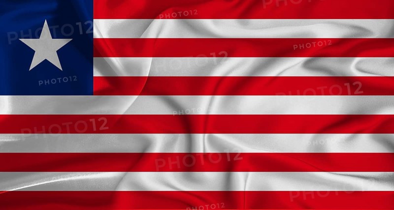 Realistic Liberia flag waving. Close up of flag of Liberia with cloth texture