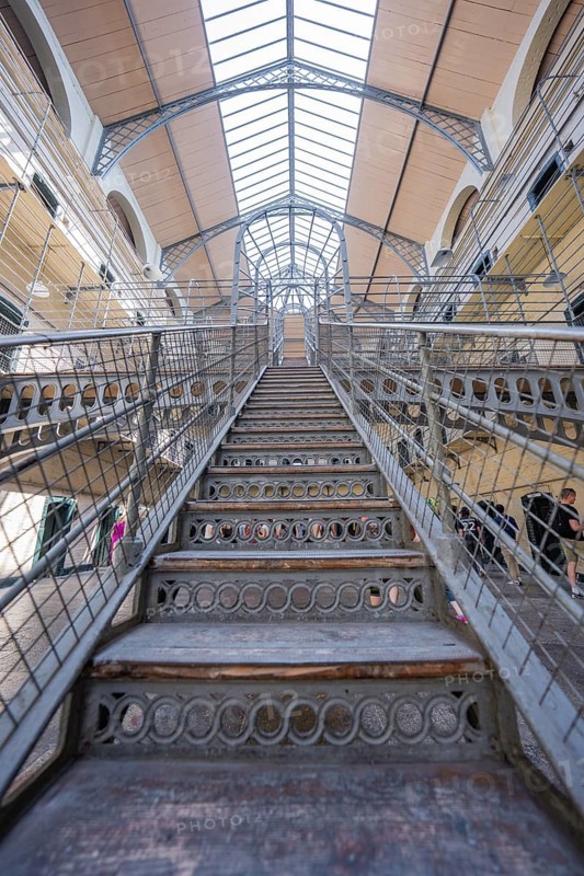 Steel staircase inside a prison under glass roof, Kilmainham Gaol Prison, Dublin, Ireland