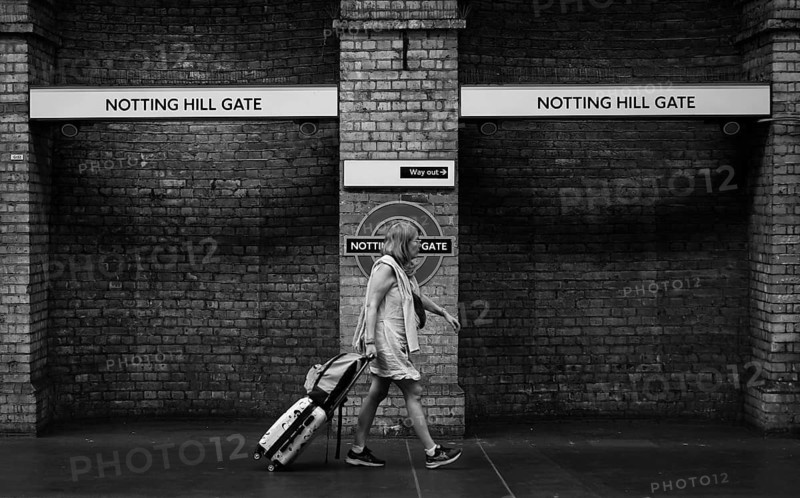 Travelers, Notting Hill Gate subway station, underground, tube, public transport, black and white, London, England, Great Britain, Great Britain