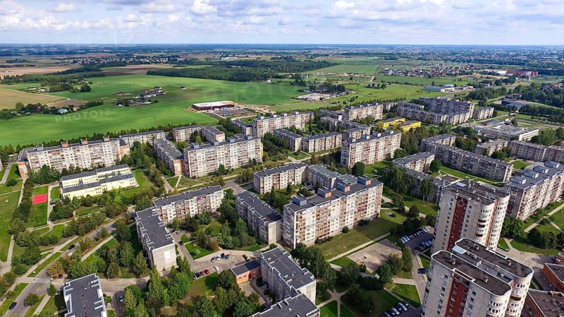 Aerial panoramic view of the southern part of Siauliai city in Lithuania. Old soviet union buildings with green countryside. Siauliai.Lithuania