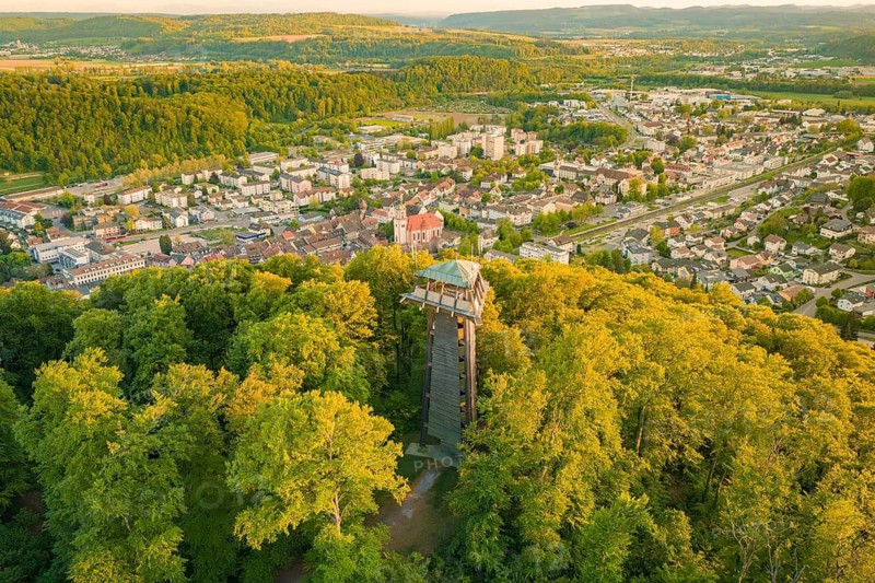 A panoramic view of an observation tower in the forest with a city in the background, Tiengen, Waldshut, Tiengen, Germany