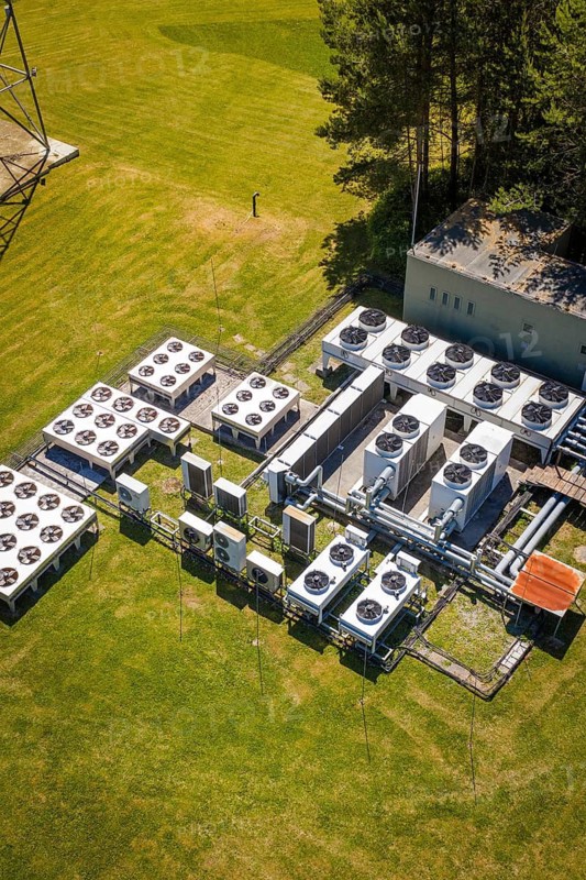 Arrangement of air-conditioning units in a meadow next to a building, Bunker Anlage, Calw, Germany
