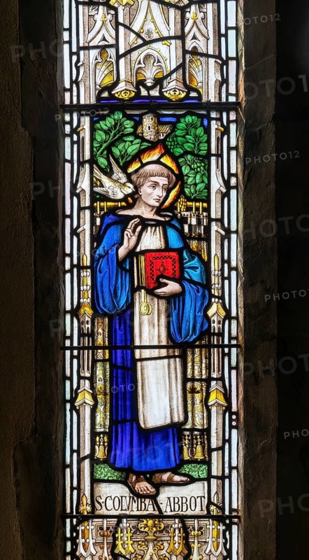 Stained glass east window depicting Saint Columba Abbot, Debenham church, Suffolk, England, UK c 1910 by Charles Eamer Kempe